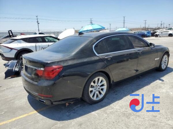 2015 BMW 730d xDrive Black — WBAYC4104FDZ77706 - Image 4